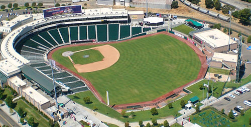 An aerial image of the Sutter Health Park in Sacramento, CA, Looking down the first base line.