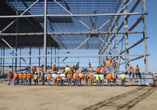 The JD2 Construction Crew in front of the steel frame of Sutter Home Wineries building under construction.