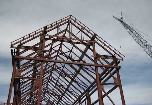 The steel frame of the Scheels Sporting Goods store during construction.