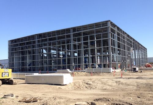 Steel frame and roof of the Tesla Assembly Plant under construction.